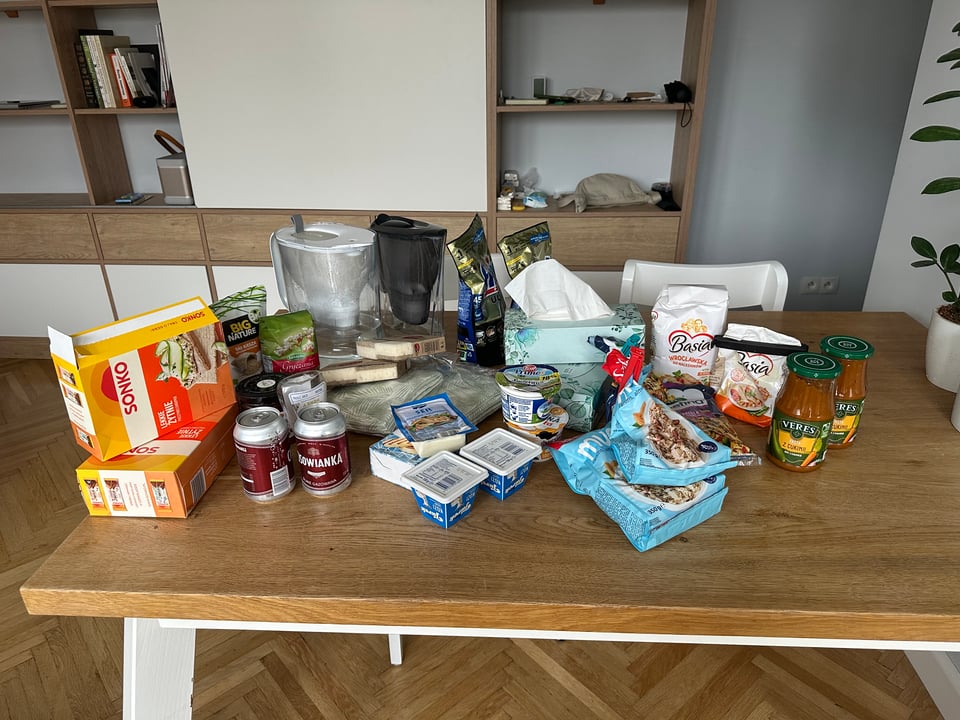 A kitchen table full of paired items