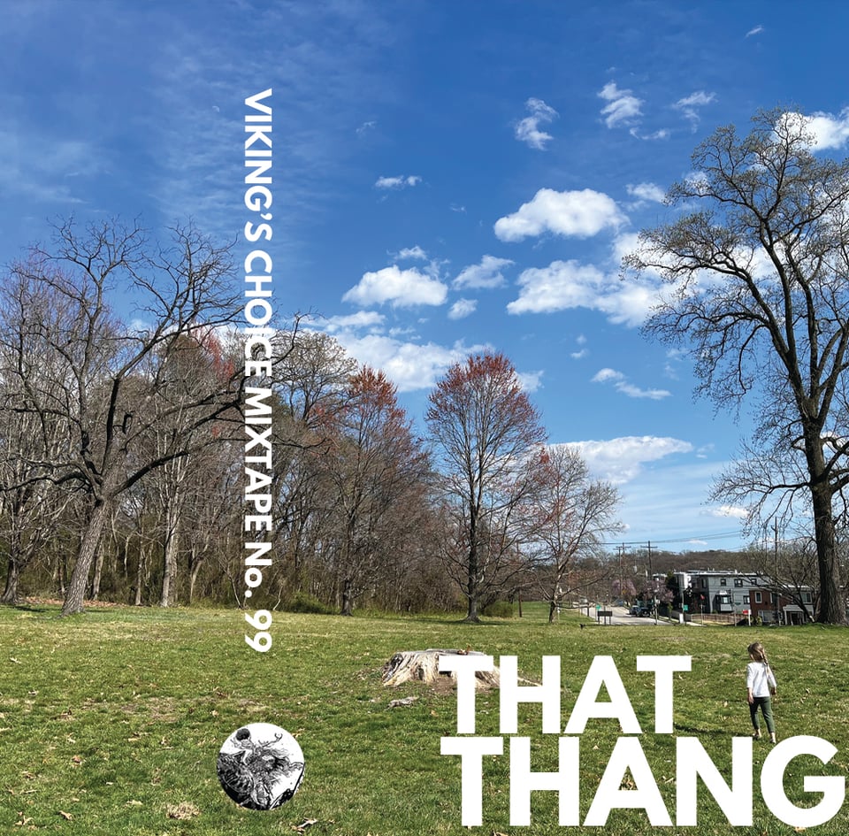 A little girl walking through a big field. Big sky, barren trees.
