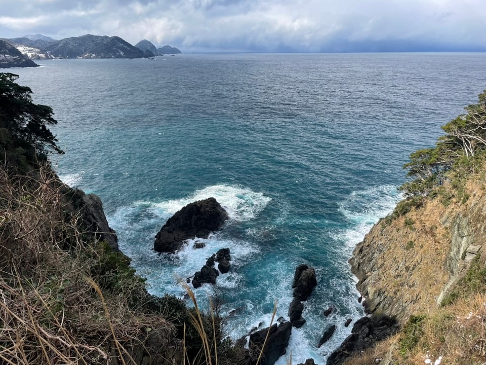 An overhead view of the ocean. The water is clean and clear.