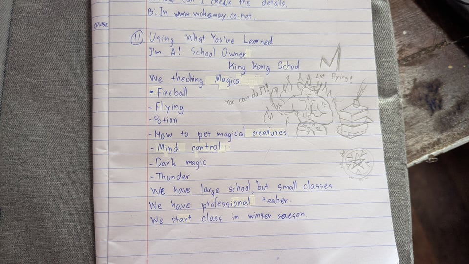 A picture from a student's notebook of a makeshift advertisement for a "magic school". "We teaching Magics" it reads.