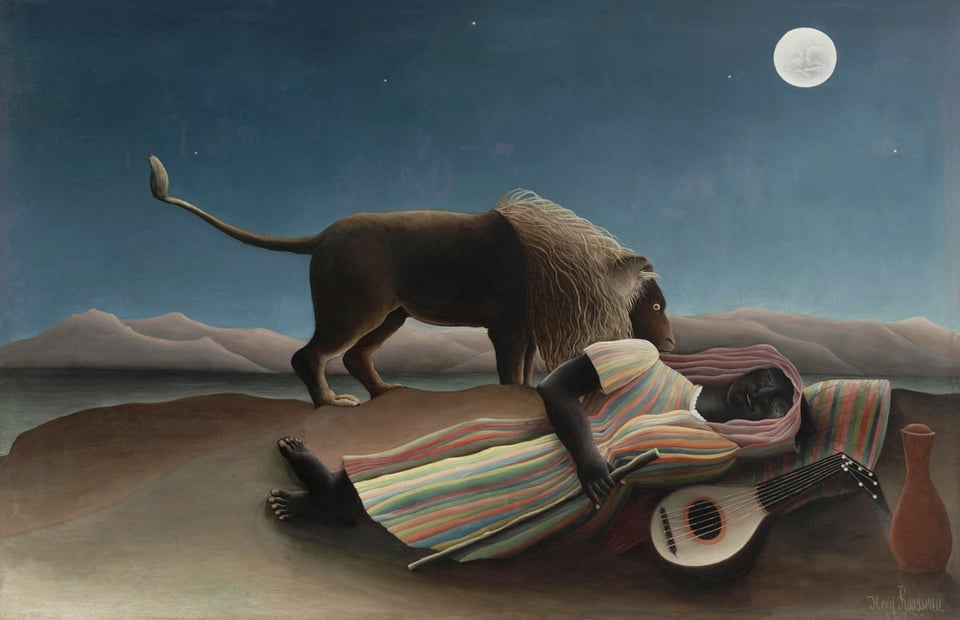 Painting of a lion sniffing a sleeping man on the desert sand. The moon is overhead and he's sleeping next to a vase and a stringed instrument. Mountains are in the distance and the night sky has a scattering of stars.