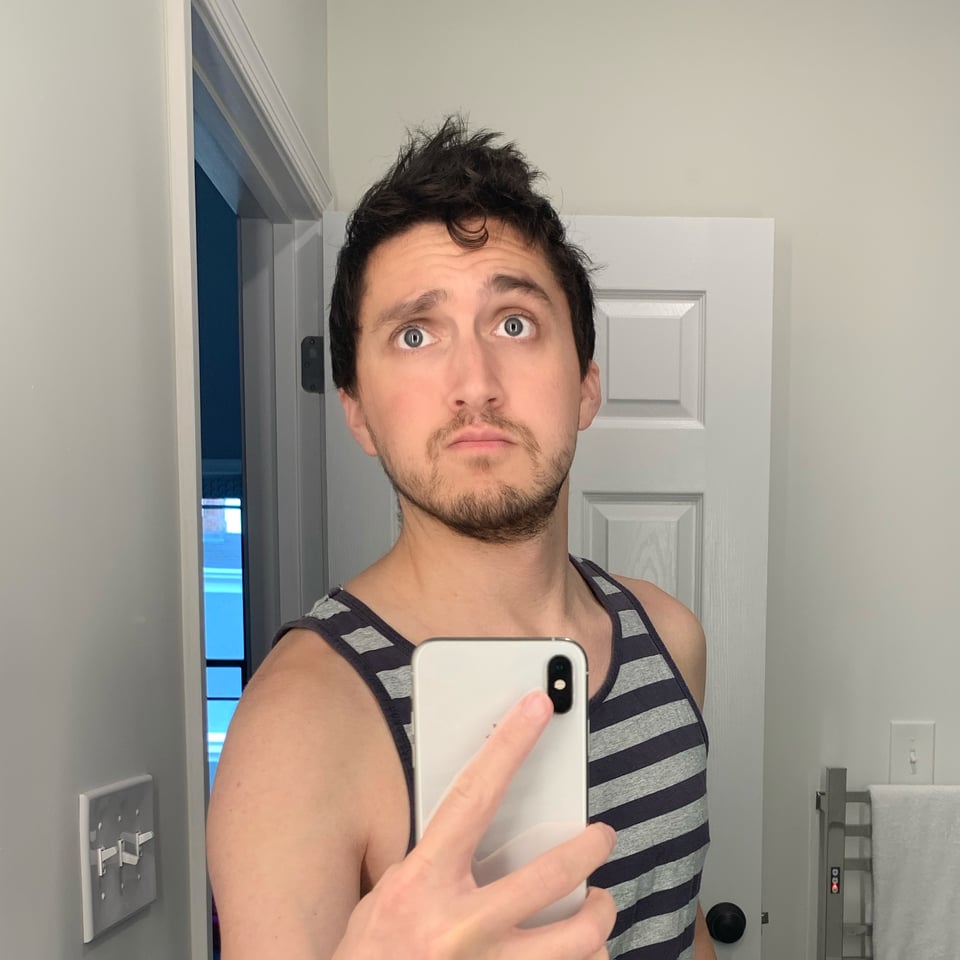 The author with long hair and a beard.