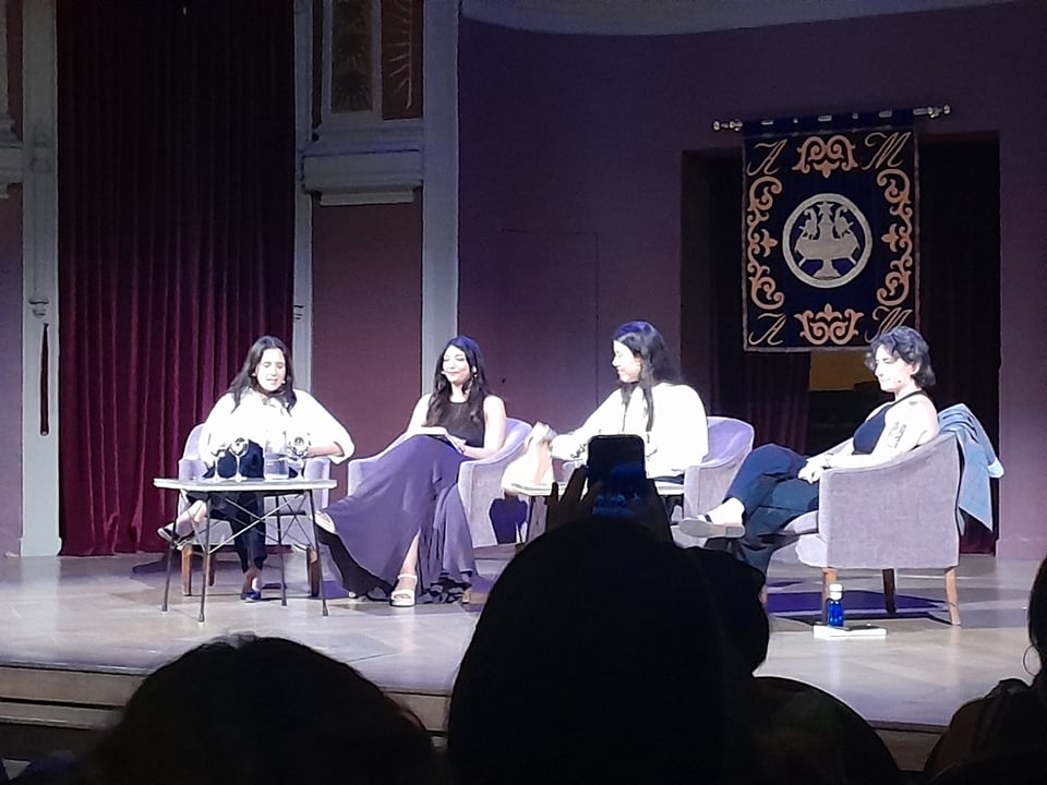 Yael van der Wouden (right) on stage with (from right to left) novelists Sara Torres and Nussaibah Younis and moderator Eleonora Balsano.