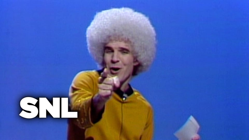 a man with an afro on snl