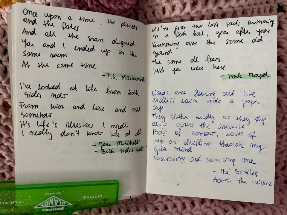 Picture of pages from a notebook with handwritten note on it