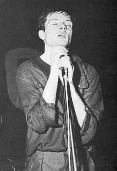 Ian Curtis performing in the late 70s.