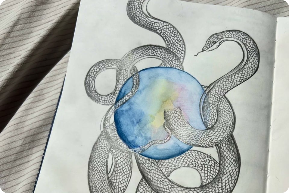 sketch of a snake wrapping around and through a moon