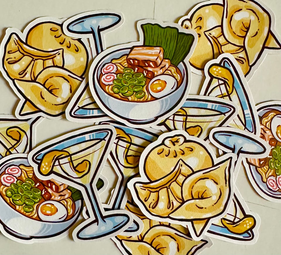 A handful of small illustrated stickers, including a ramen bowl, an assortment of dumplings, and a cocktail