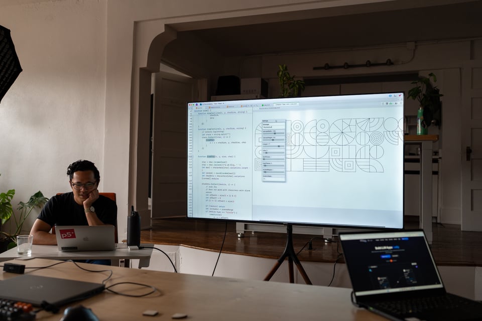 Norton showing a presentation on the screen.