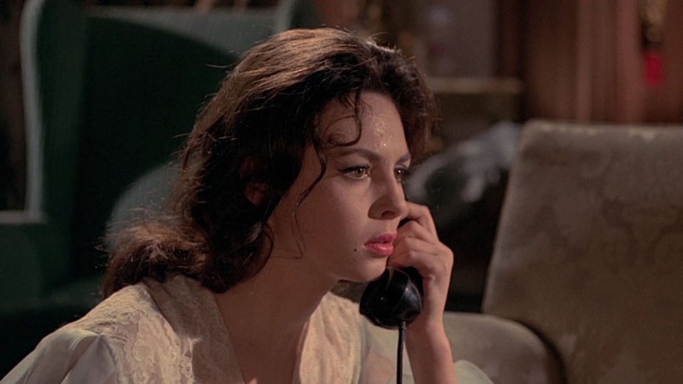 Michele Mercier as Rosy, listening to her stalker in the Black Sabbath segment 'The Telephone'