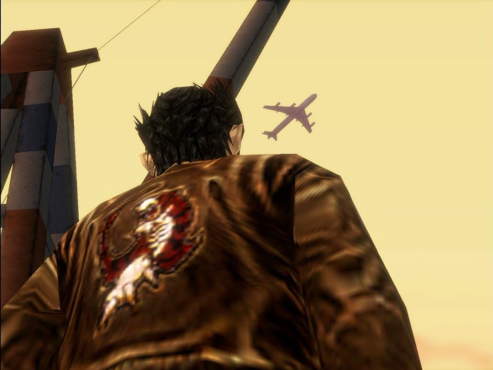 Screenshot from the game Shenmue of the main character Ryo looking up at an airplane flying overhead