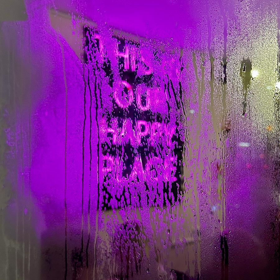 This is our happy place neon sign