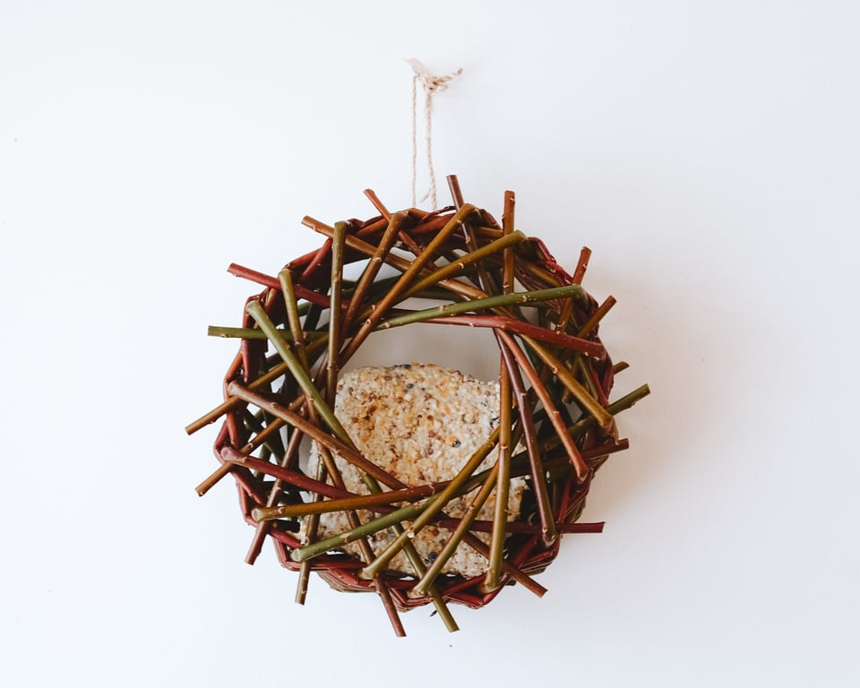 A bird feeder made from willow