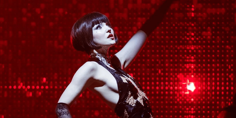 Dove Cameron in full Cabaret flair.