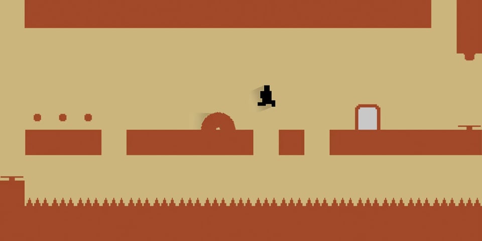 A blocky 9-bit platform game in orange and red.
