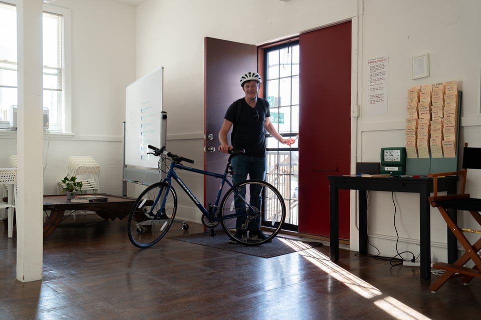 Trevr bringing his bike in.