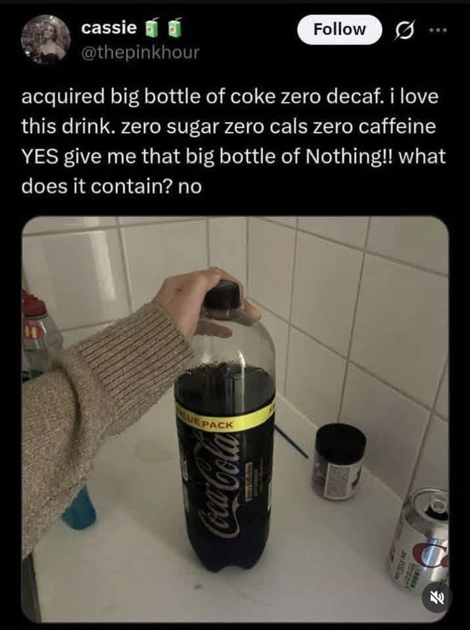 Twitter screenshot. Image is of a person's hand resting on a large bottle of coke with a black label.
@thepinkhour:
aquired big bottle of coke zero decaf. i love this drink. zero sugar zero cals zero caffeine YES give me that big bottle of Nothing!! what does it contain? no