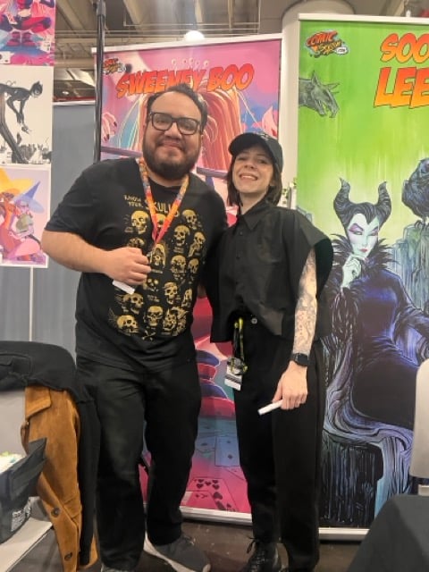 two people at a comic convention