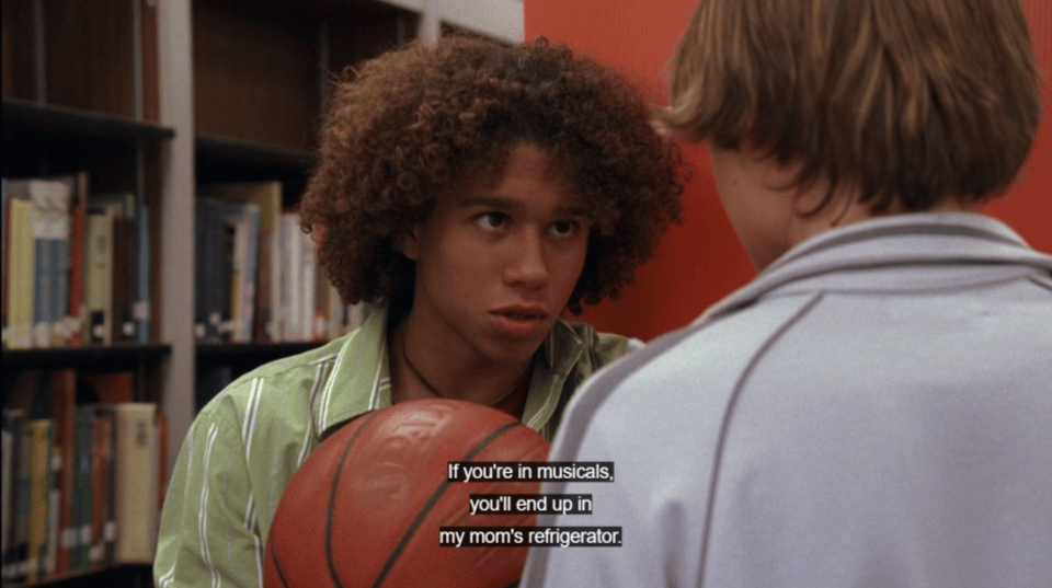 A context-free screencap from High School Musical. Chad tells Troy that if he sings in musicals, he'll end up in Chad's mom's refrigerator.