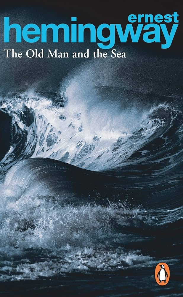 Large waves crash at the edge of the ocean, a moody, black and white image