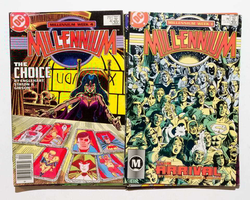 two stacks of Millennium comics side by side. Issue 4 and issue 1