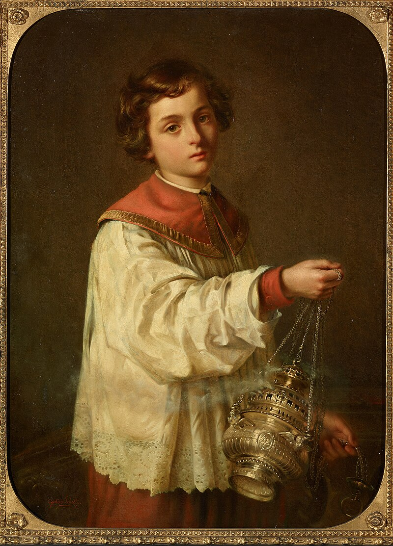 Un enfant avec un enscensoir