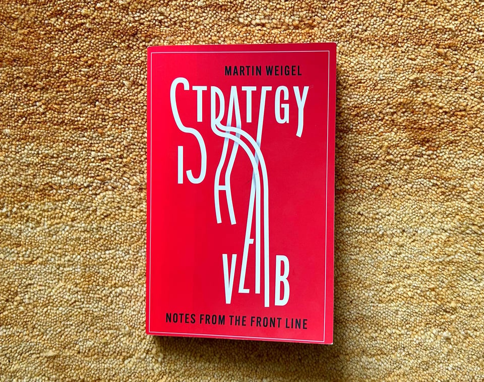 Photograph of the book, "Strategy is a Verb" by Martin Weigel. The sub-title is, "Notes from the front line"