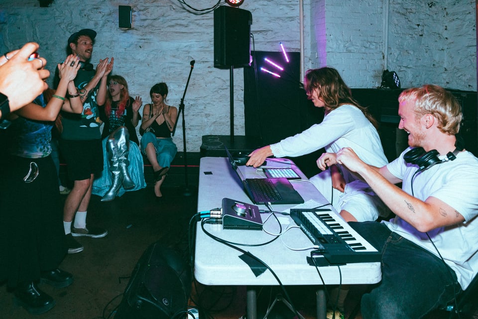 Crowd applauding as Surface celebrate the end of their set