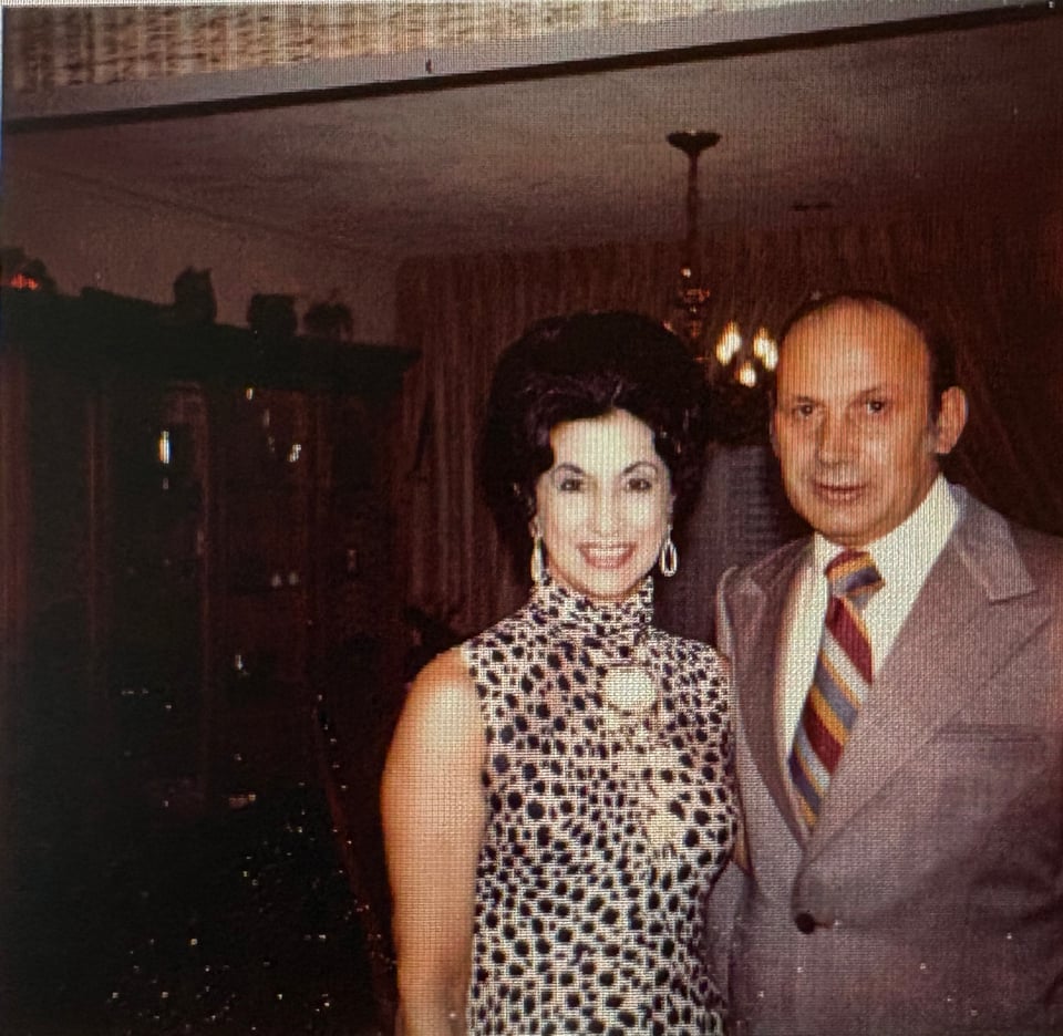 Two dressed up people in the 1960s or 1870s (Monica's grandparents!)