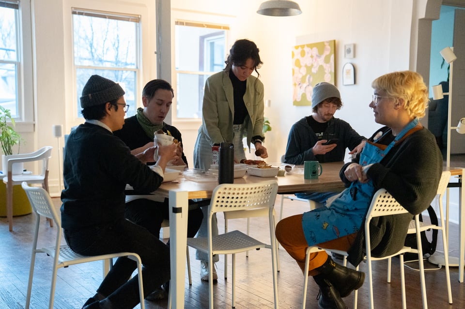 People sitting around a table.