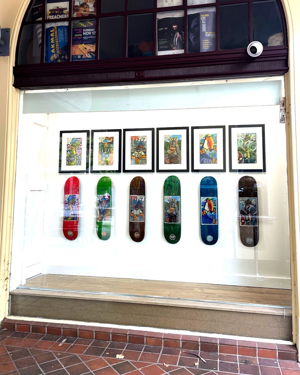 Photo of Matt Green's artworks and skateboards installed in the window gallery