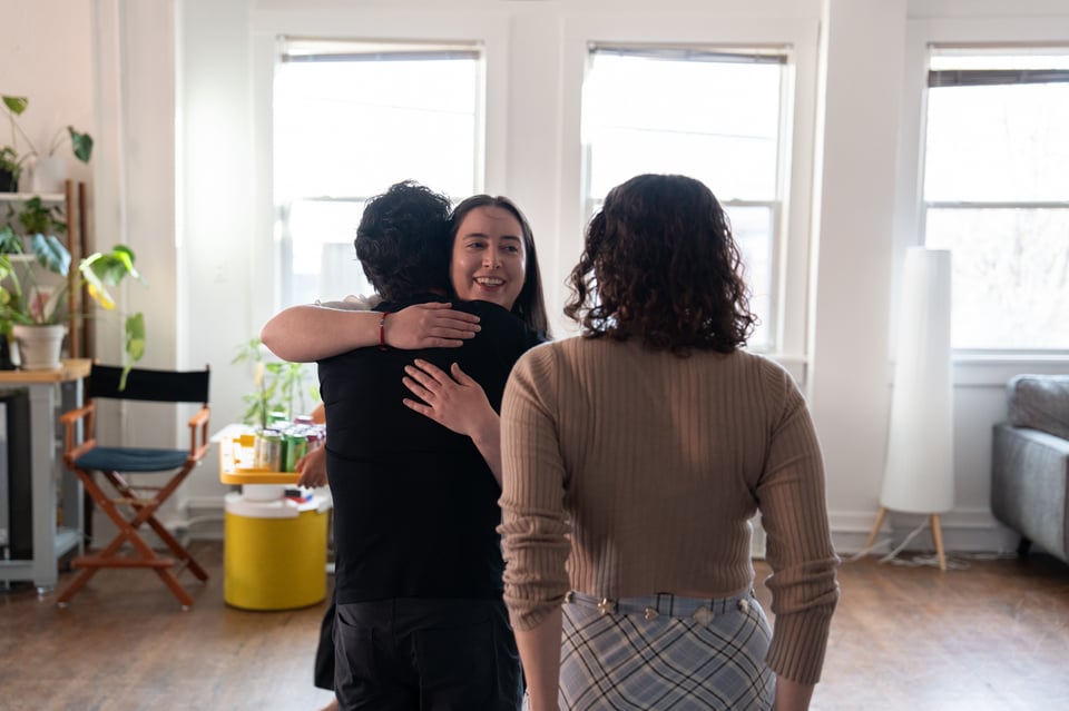 People hugging.