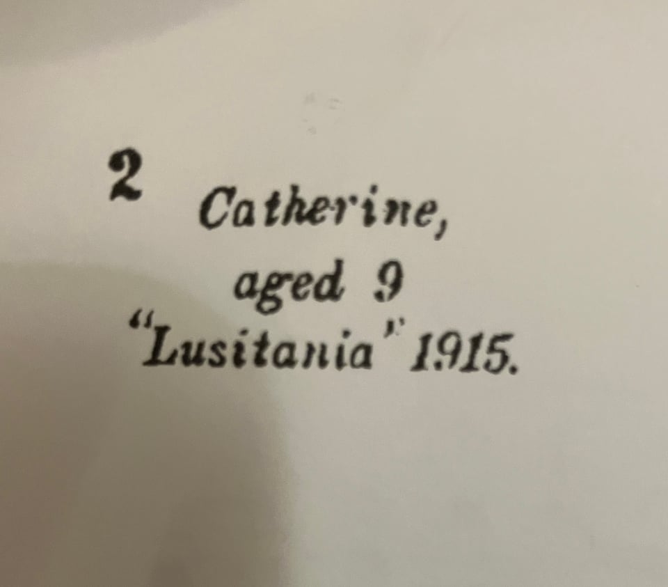 An inscription reading "Catherine, aged 9 'Lusitania' 1915." It is below a 2, which is the page number.