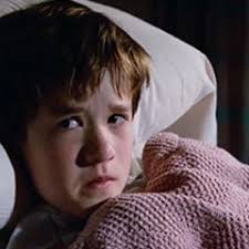 Hayley Joel Osment in "The Sixth Sense", in bed with the blanket drawn up around his neck, confessing that he sees dead people all the time.