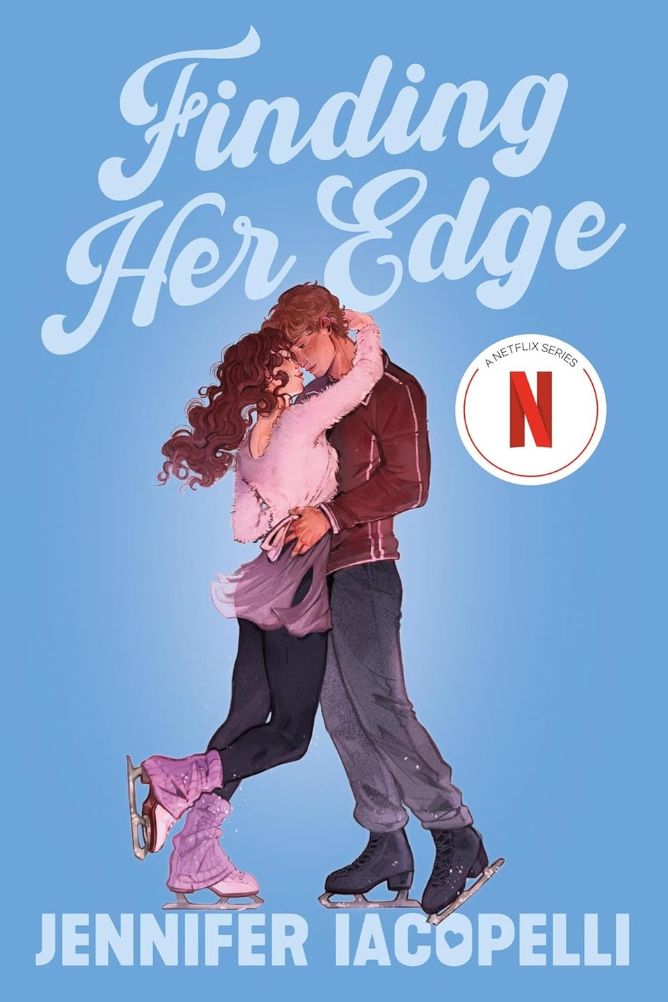 The redesigned paperback cover of FINDING HER EDGE by Jennifer Iacopelli. A skating couple on a blue background with their arms wrapped around each other lovingly.