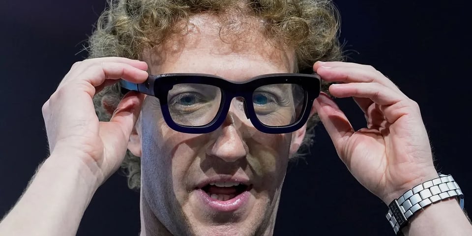 An idiot putting on stupid glasses.