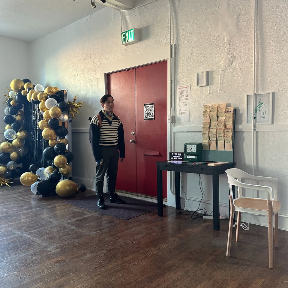 Dan standing by the door waiting for someone who never comes.