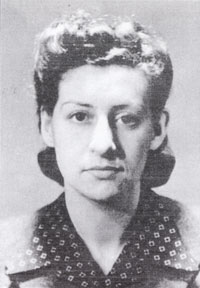 A black and white passport-style photograph of a young woman with a slight smile, a wide collar and hair pinned in a 1940s style.