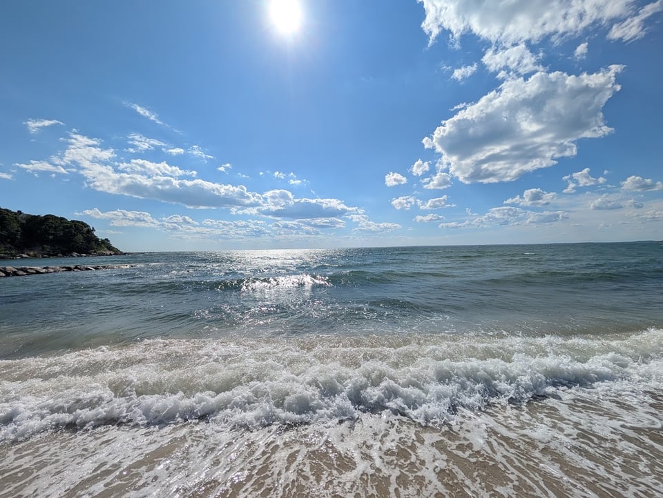 Waves crash on a beach in Falmouth, Massachusetts