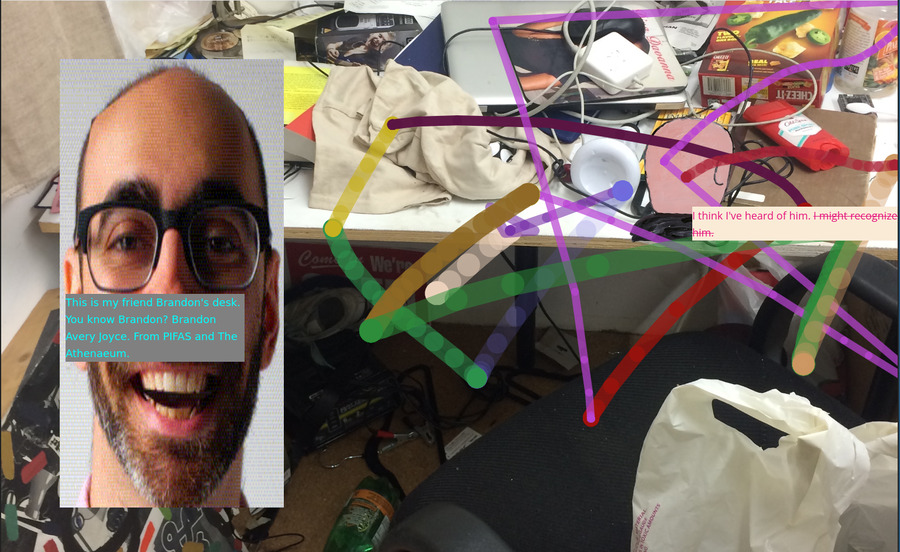 Photo of messy desk with my head in a layer above it and messy drawing on screen, and I have a dialog box about Brandon