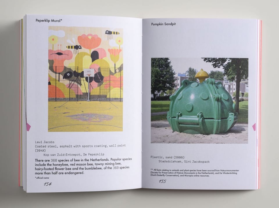 An open book showing photos from playgrounds in Rotterdam