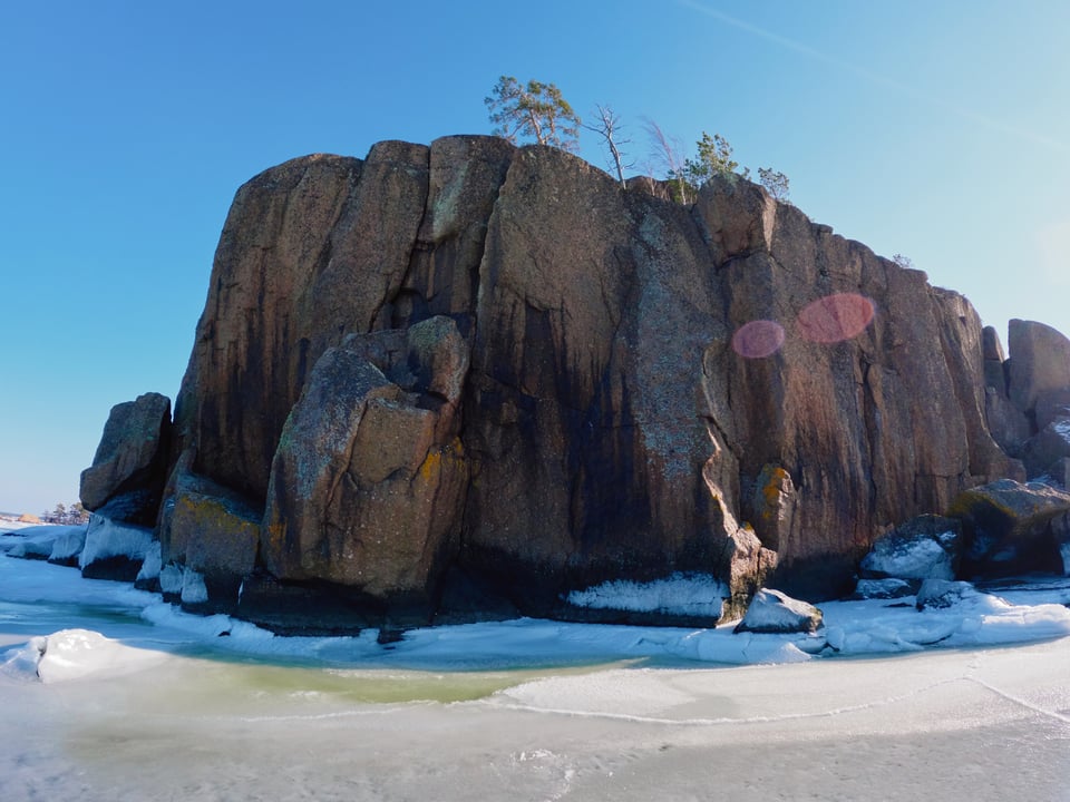 A rocky isle on a sunny day.