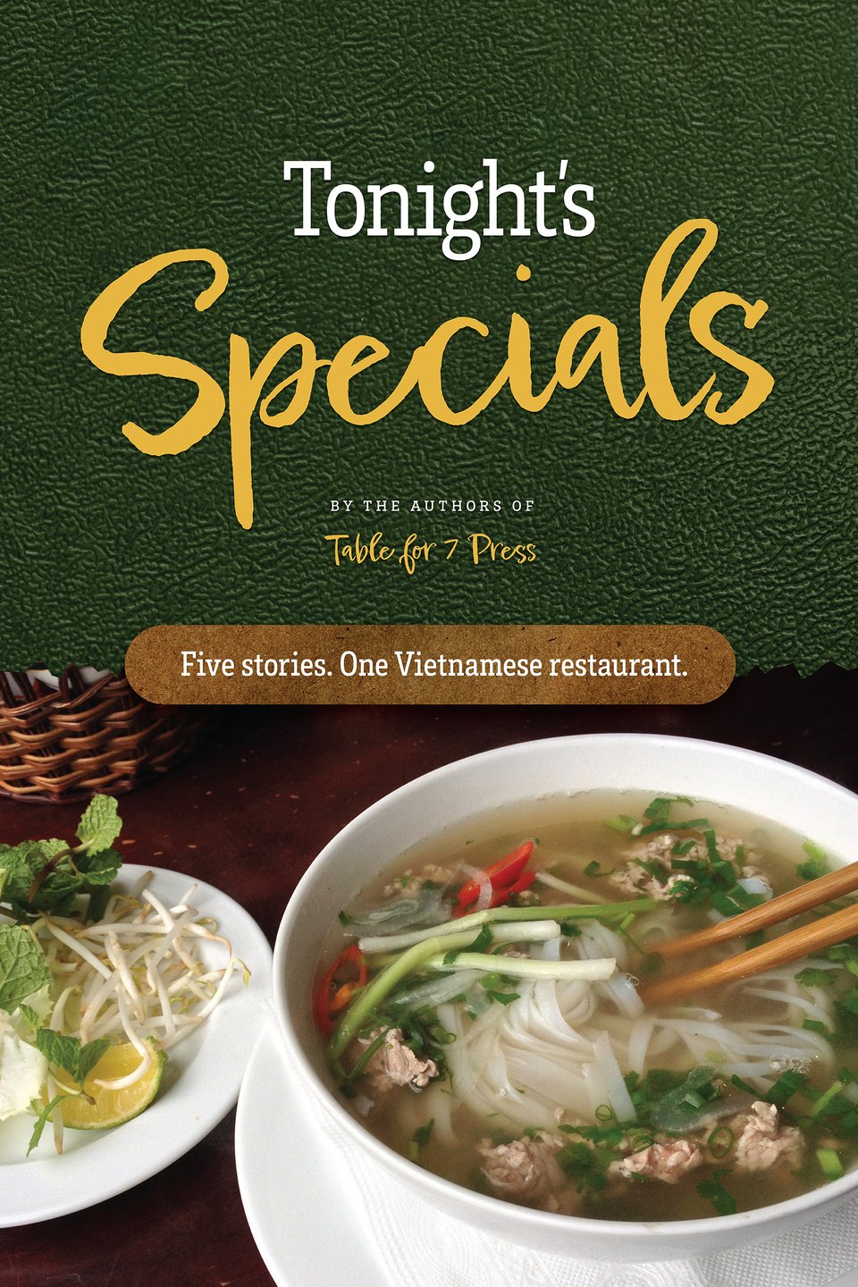 Book cover for anthology, featuring a steaming bowl of Vietnamese pho soup and sides, include bean sprouts and lime
