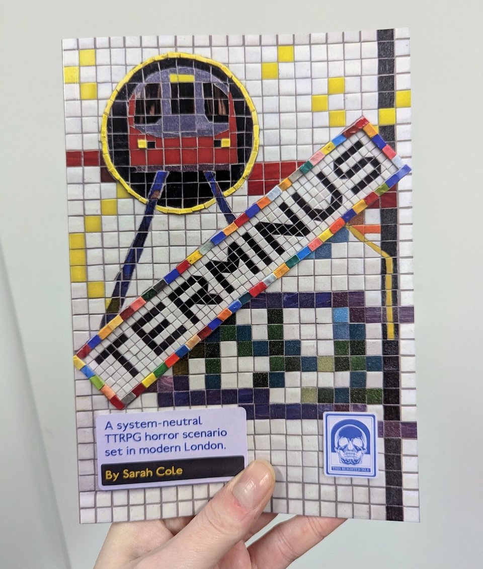 A paperback copy of TERMINUS, with its mosaic-design cover.