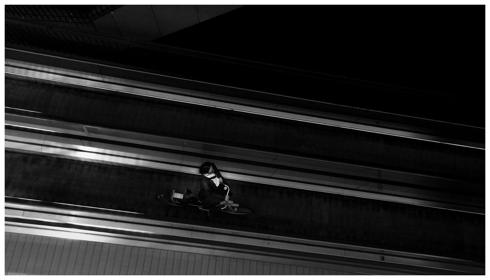 a person with a bike on a ramp
