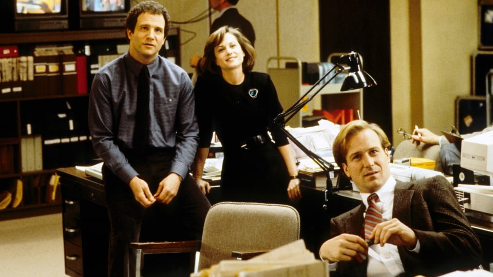 Still image from “Broadcast News.”