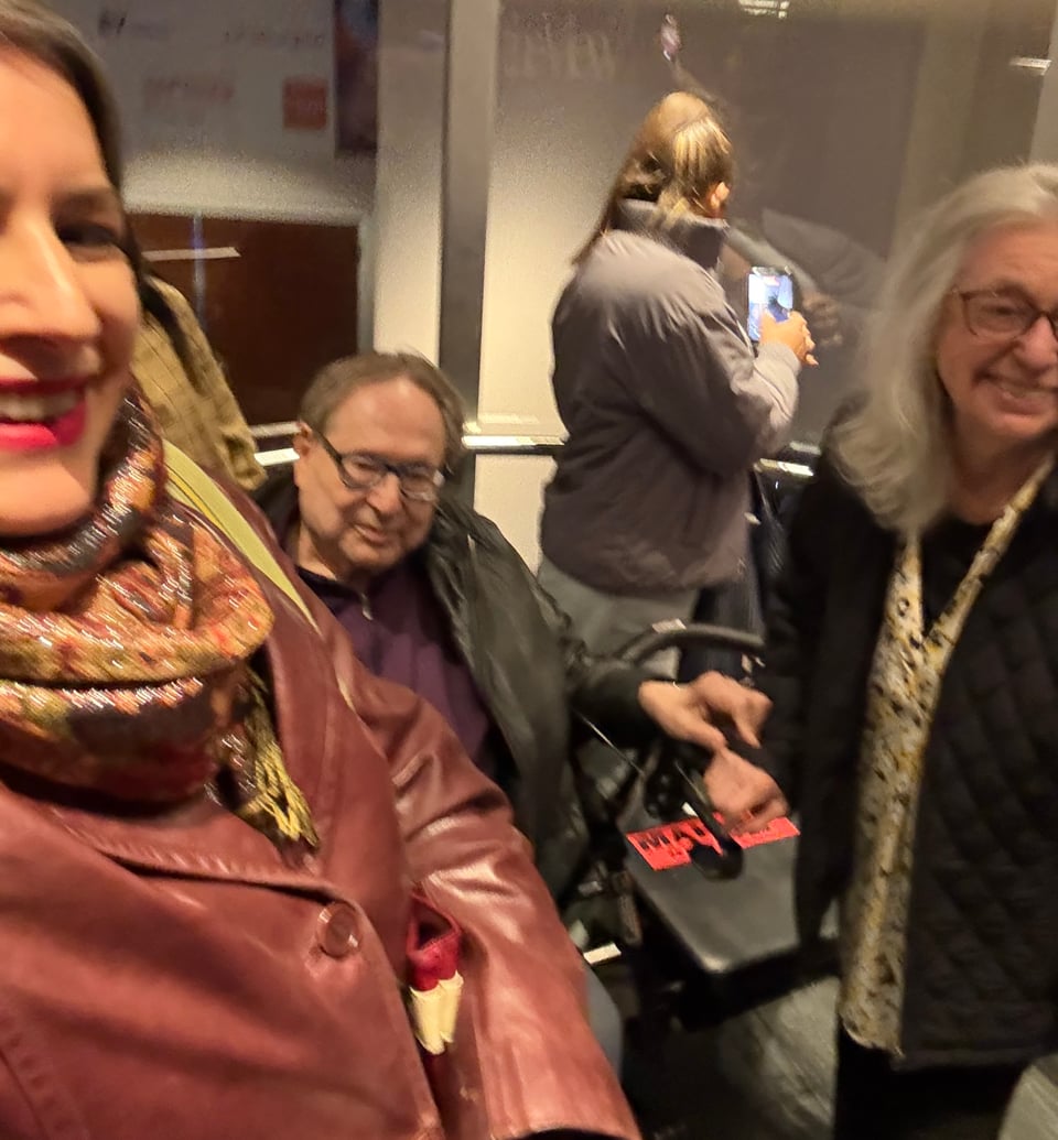 family selfie in elevator