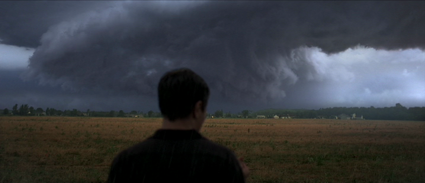 Michael Shannon on the plains, before a tornado/storm.