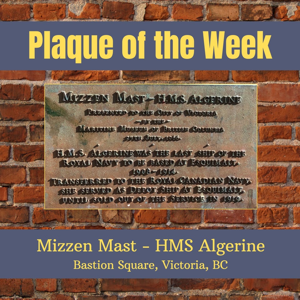 Text across the top and bottom on a brick wall background. A photo of a plaque in the middle. The text reads: Plaque of the Week. Mizzen Mast - HMS Algerine. Bastion Square, Victoria BC