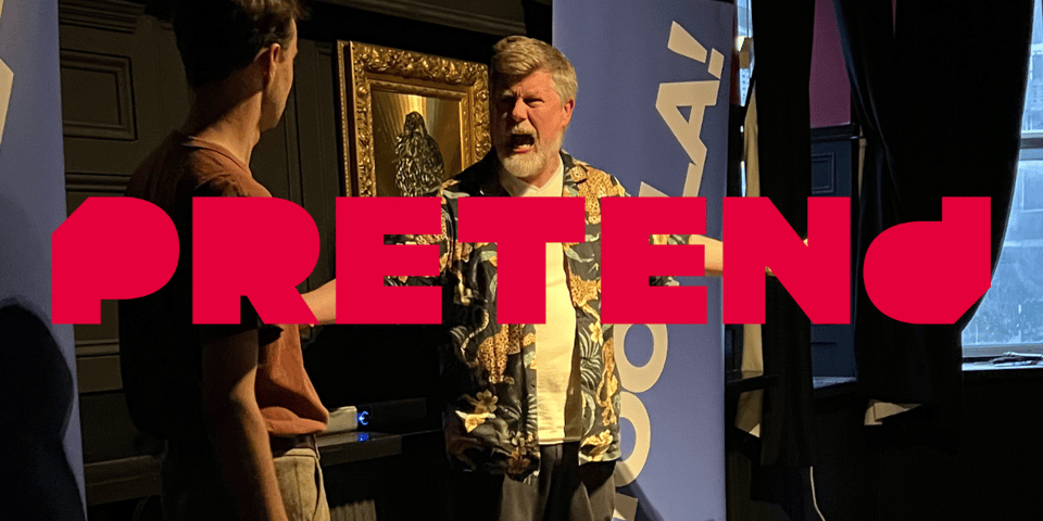 An image of Liam and me doing improv with the Pretend logo overlaid.